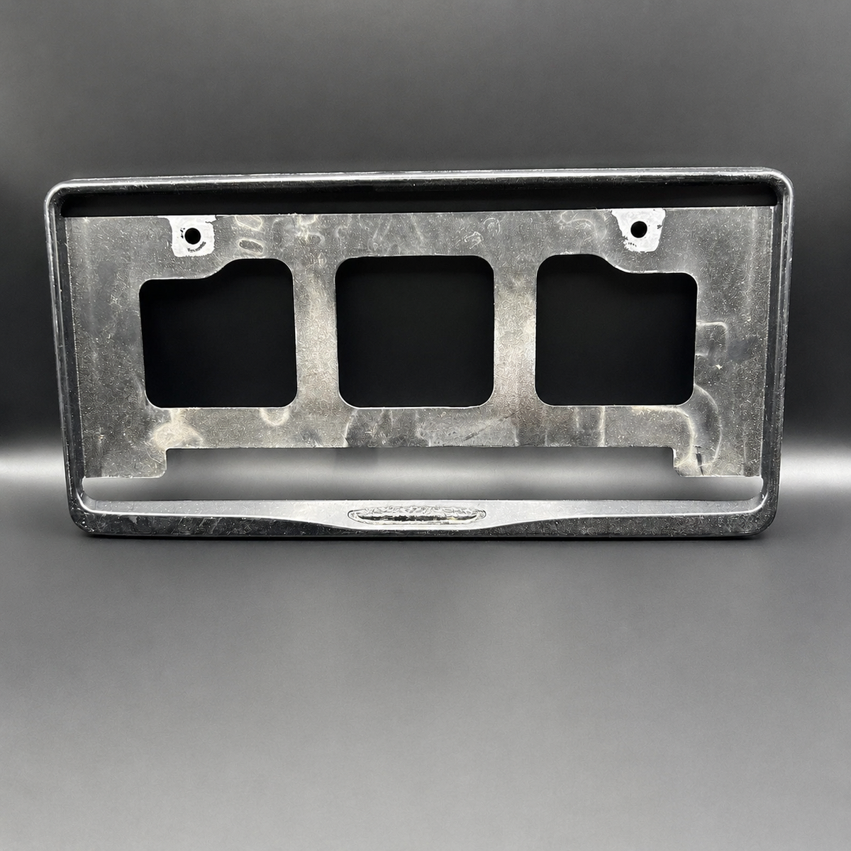 Damaged License Plate Frame Surrounds