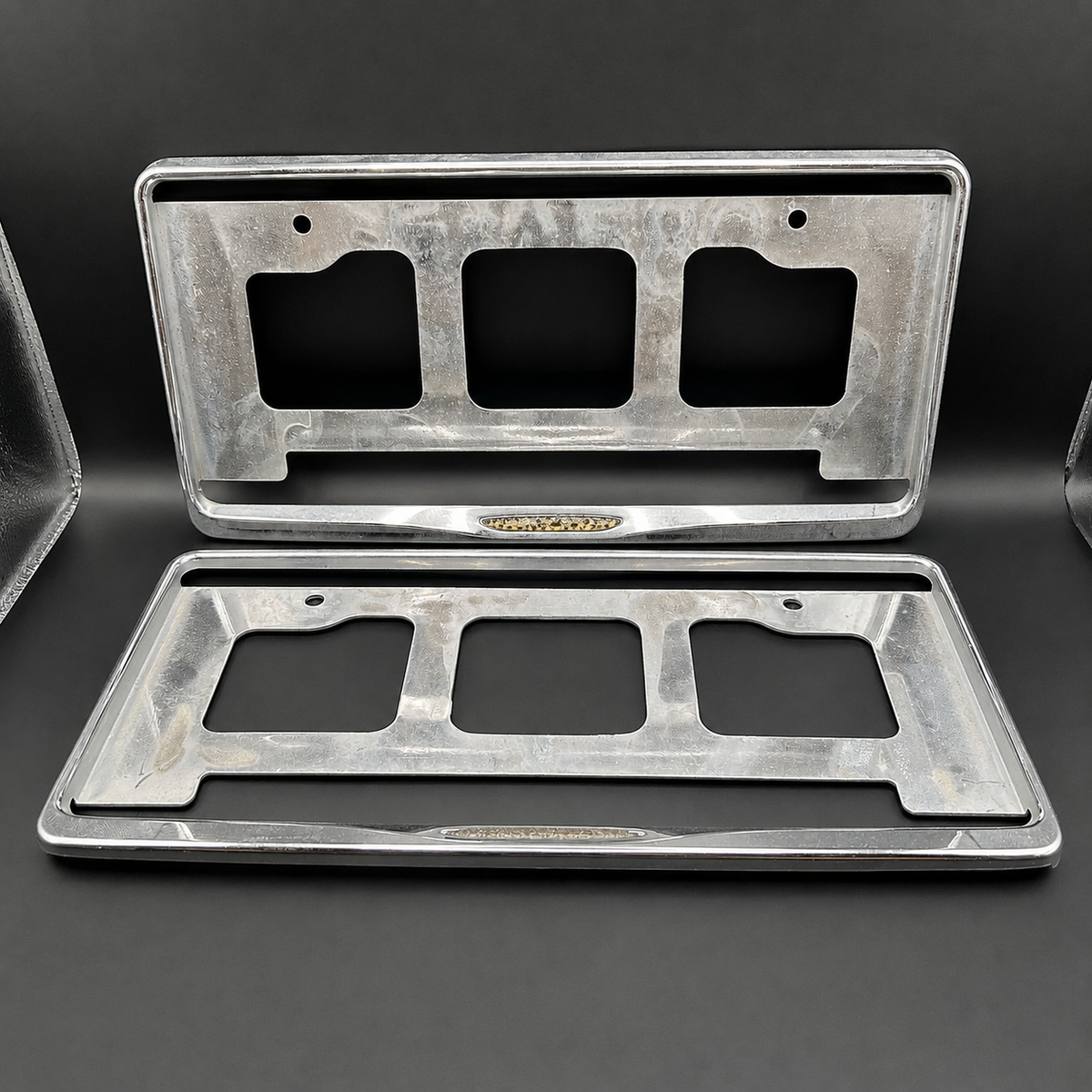 Damaged License Plate Frame Surrounds