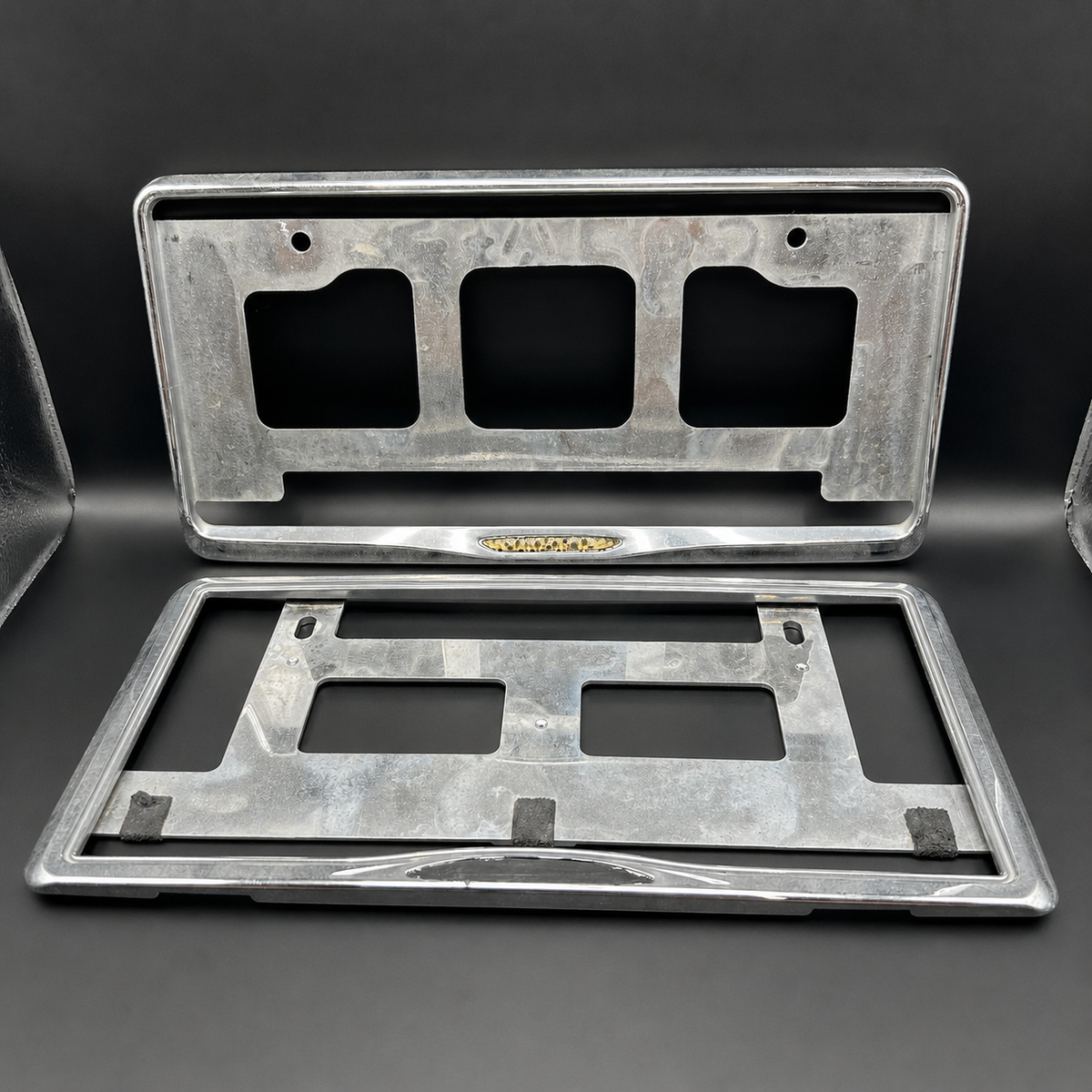 Damaged License Plate Frame Surrounds