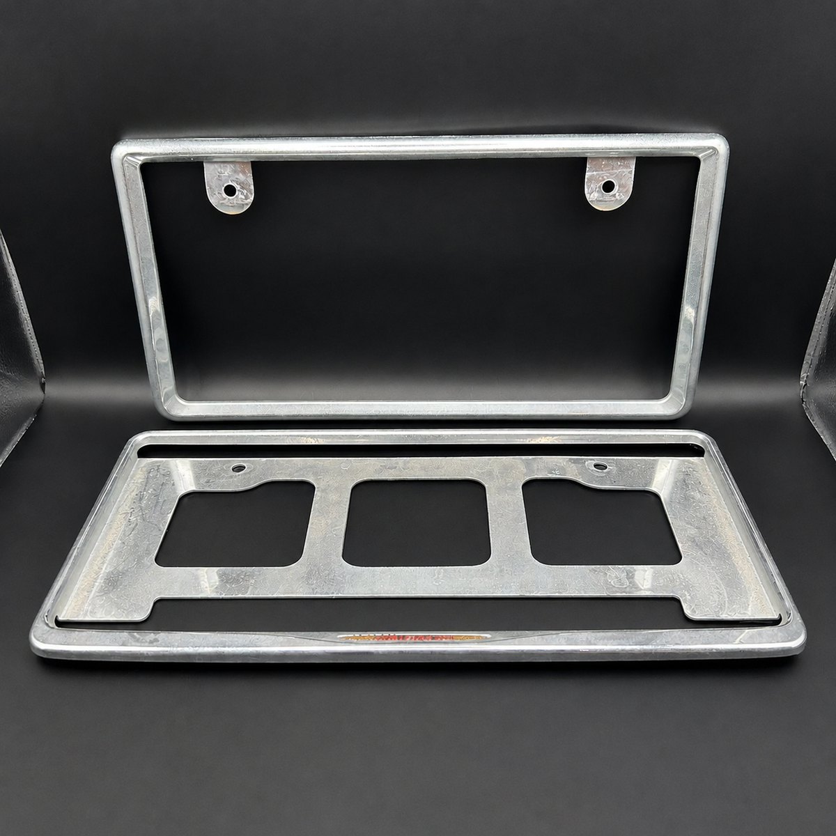 Damaged License Plate Frame Surrounds